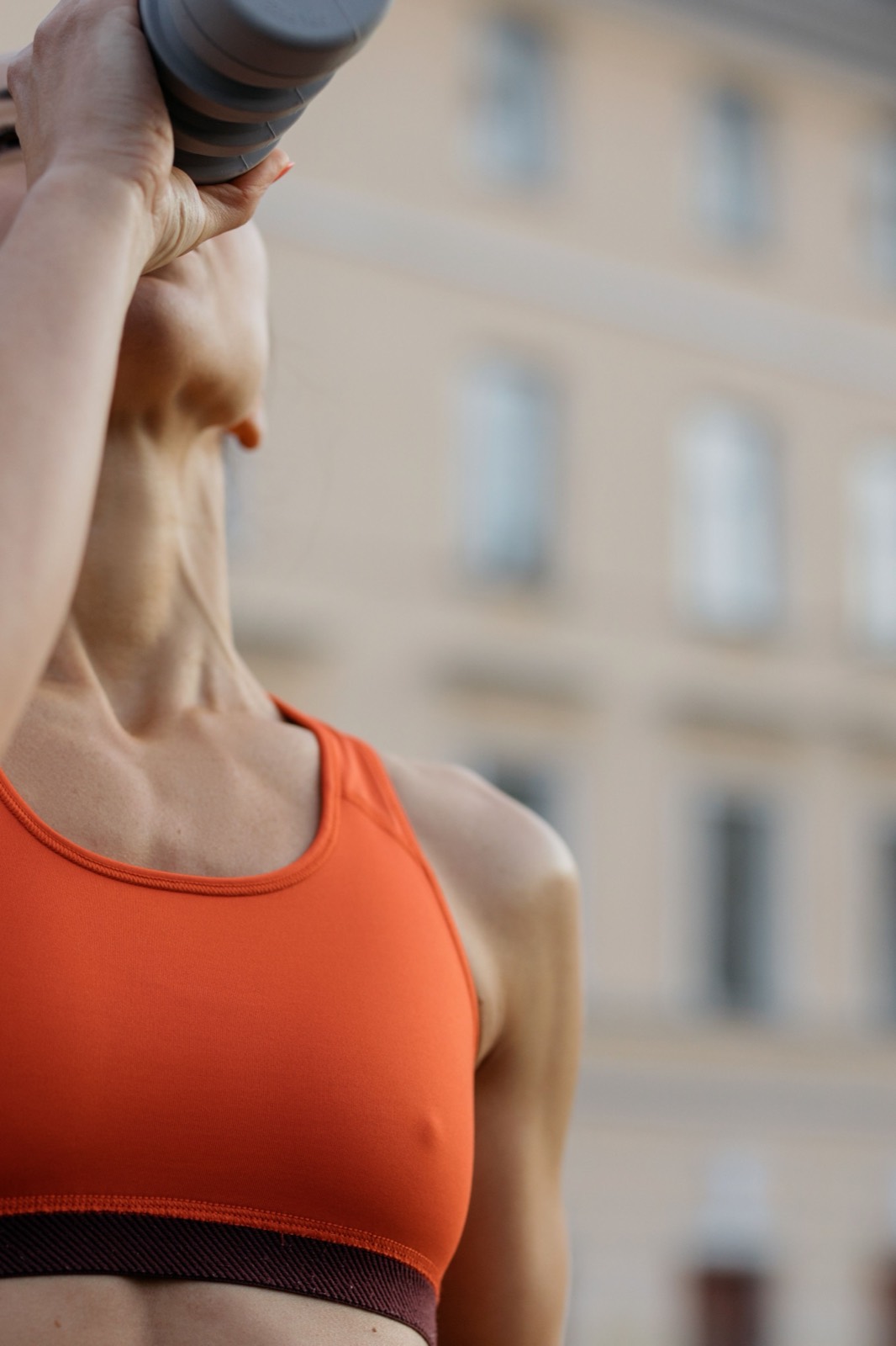 Active adult stretching at home as part of a daily strength routine